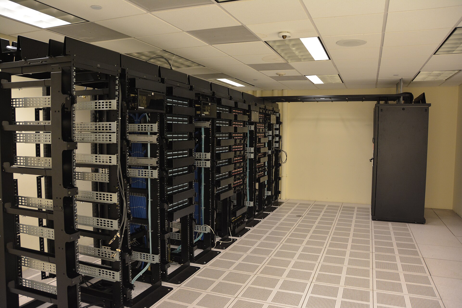 Rows of server racks inside a data center
