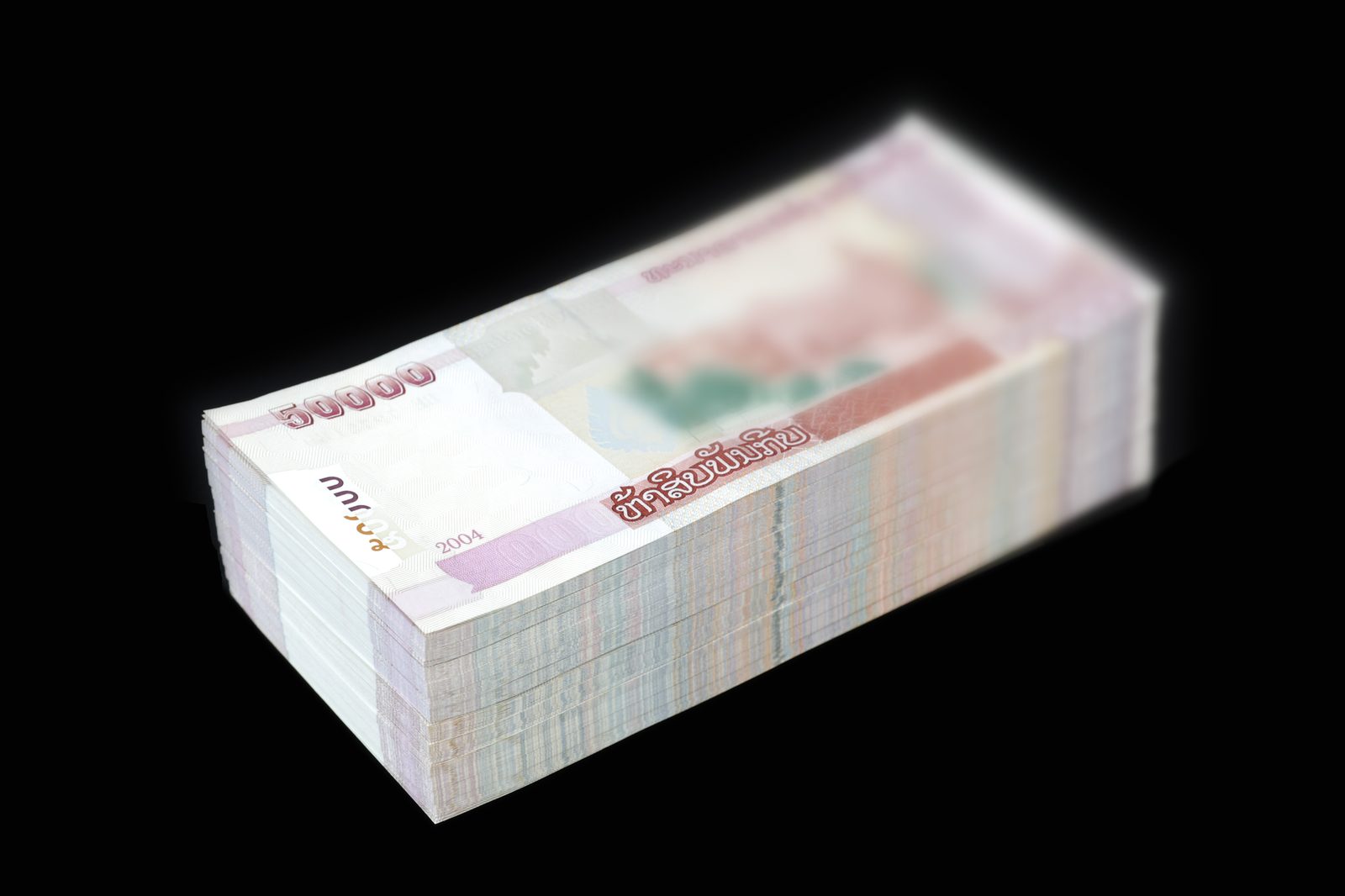 Stacks of banknotes, illustrating global money laundering and illicit financial flows
