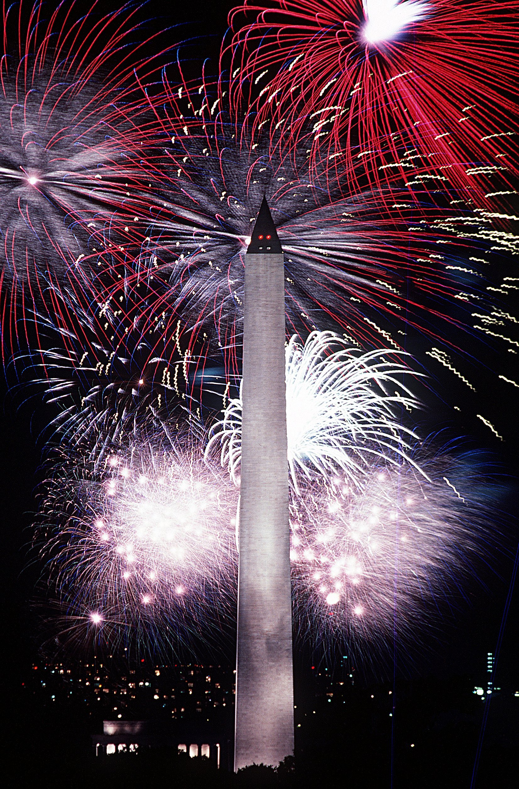 july4-fireworks-washington-monument Fourth of July fireworks burst behind the Washington Monument on the National Mall