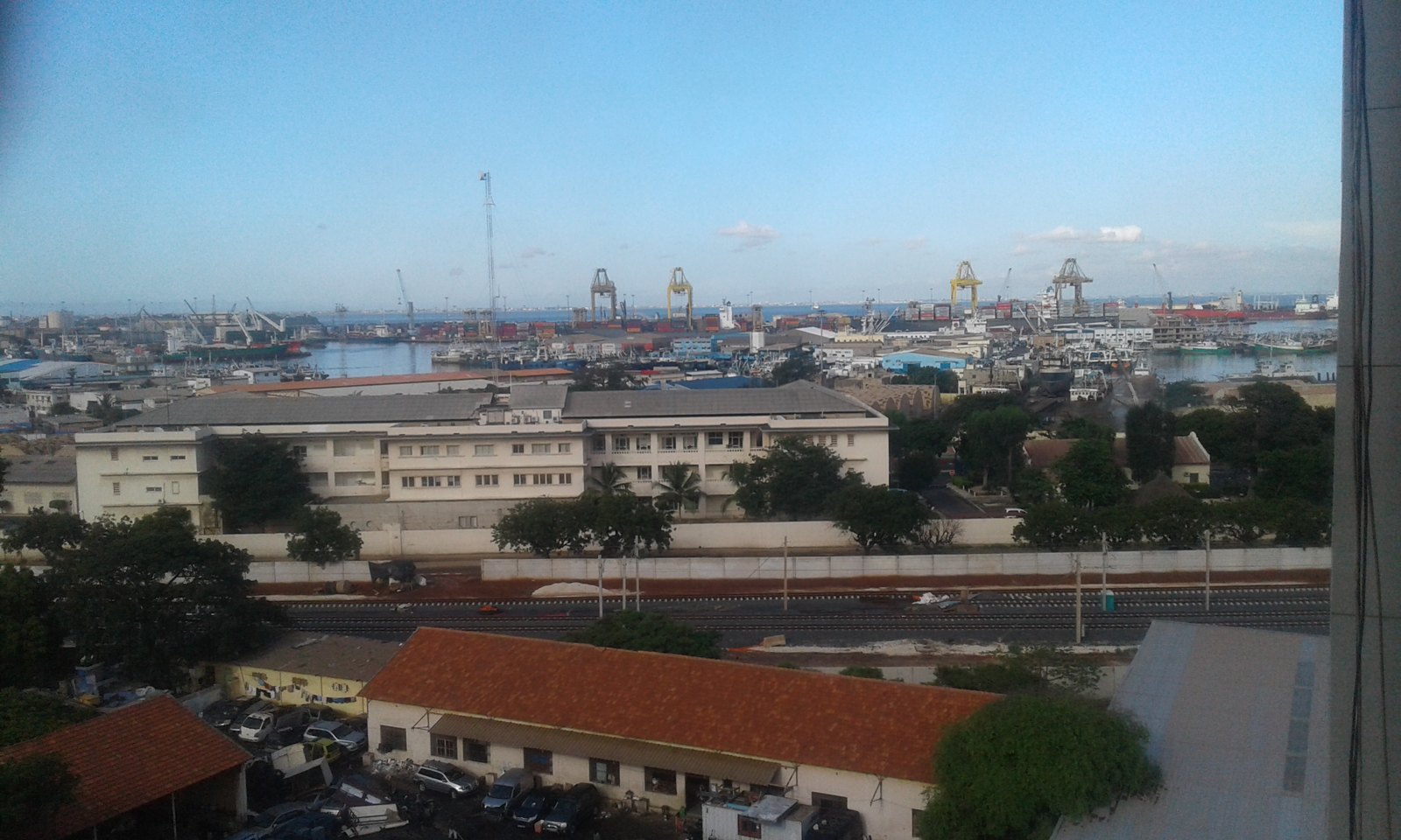 Port of Dakar, Senegal Container cranes at the Port of Dakar, Senegal, with the city in the foreground