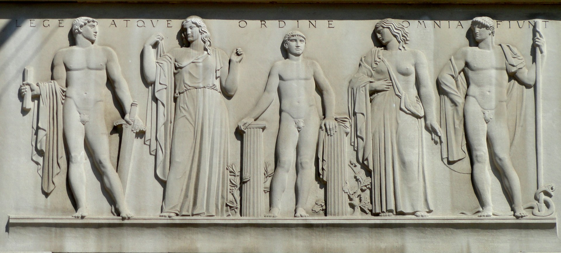 doj-watch-2026-09-16-rfk-building Facade of the Robert F. Kennedy Department of Justice Building in Washington, D.C., with the inscription Lege Atque Ordine Omnia Fiunt