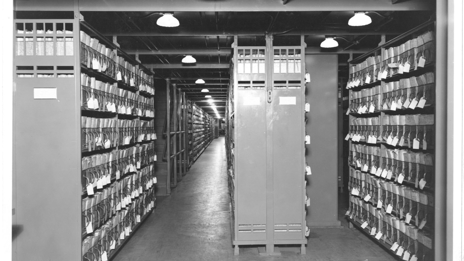Federal records stacks, National Archives (1936) Rows of shelved federal records in a National Archives stack area