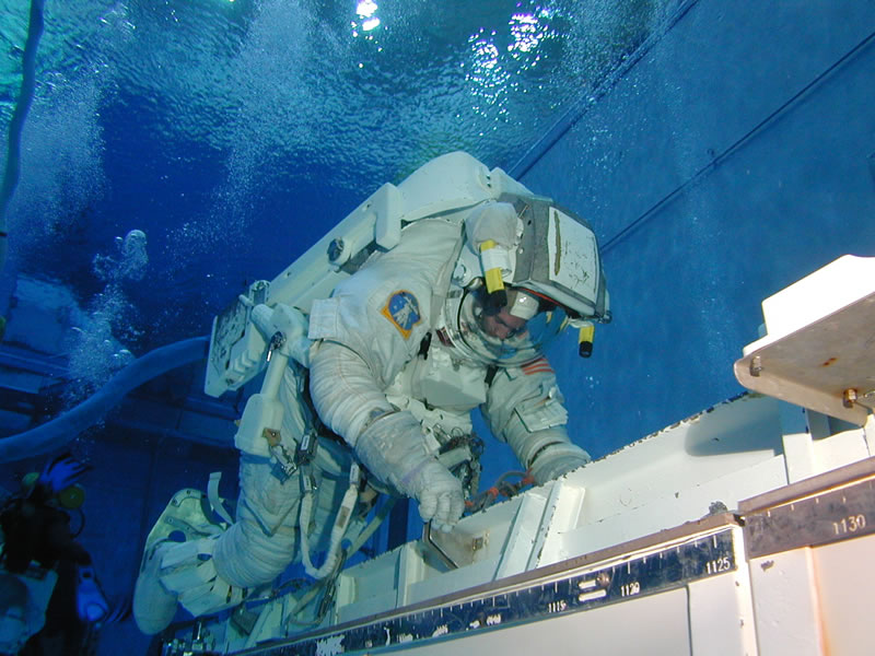 NASA Neutral Buoyancy Laboratory astronaut training Astronaut in spacesuit training underwater at NASA Neutral Buoyancy Laboratory